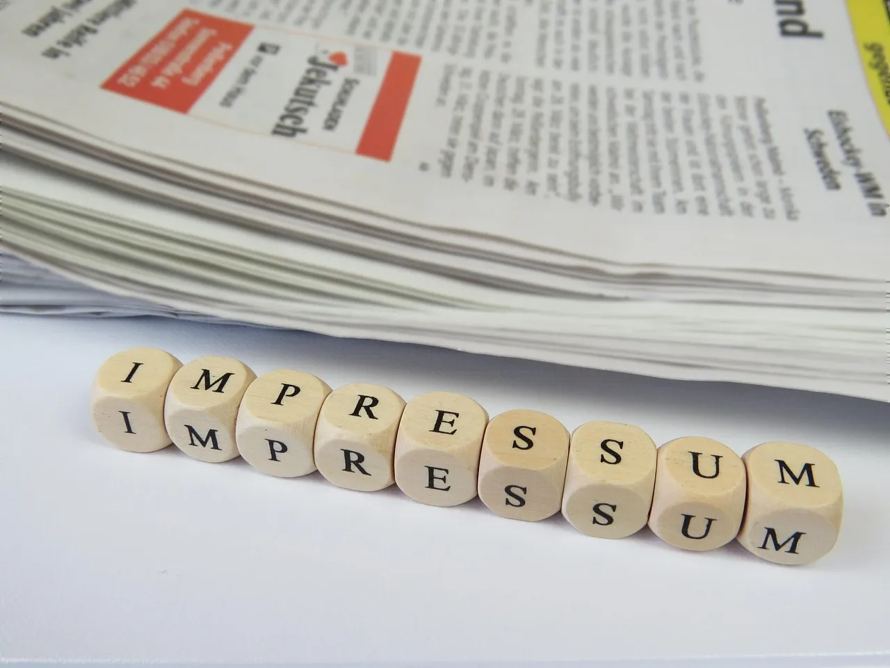 Impressum, web design, law, newspaper